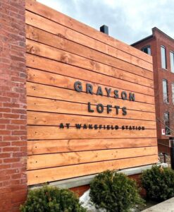 wooden exterior sign, brown